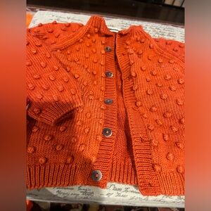 Like new hand made high fashion sweater